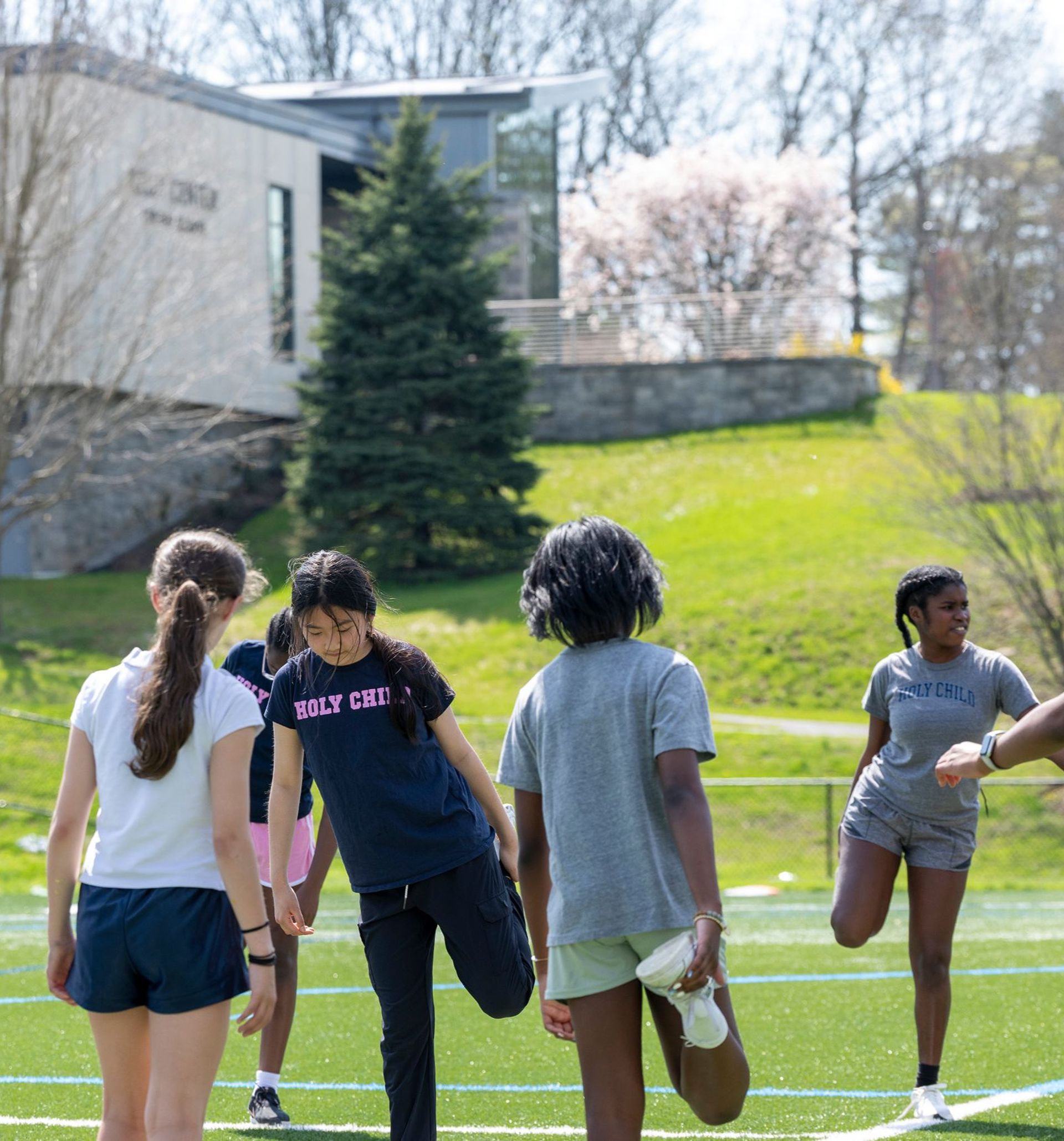 Middle School students running on Gryphon Field.