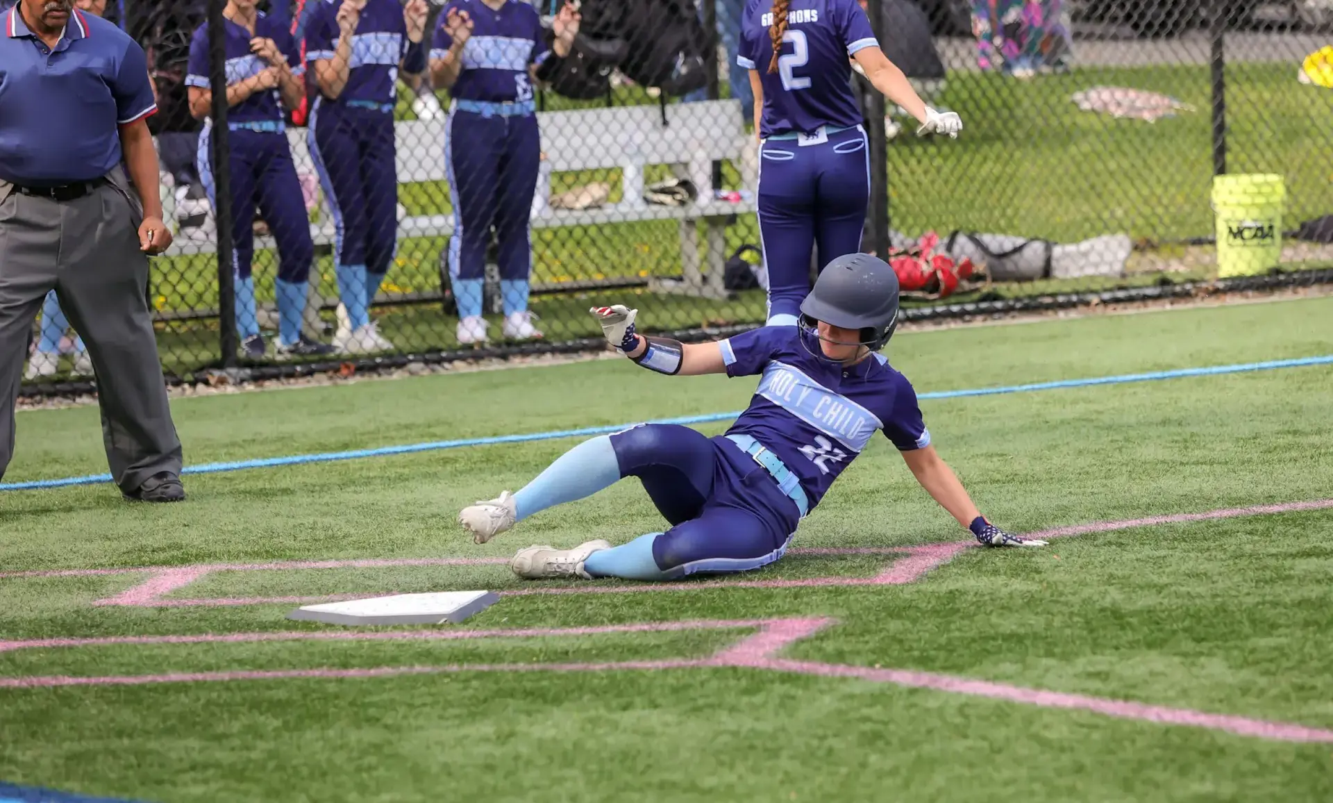 Student playing softball