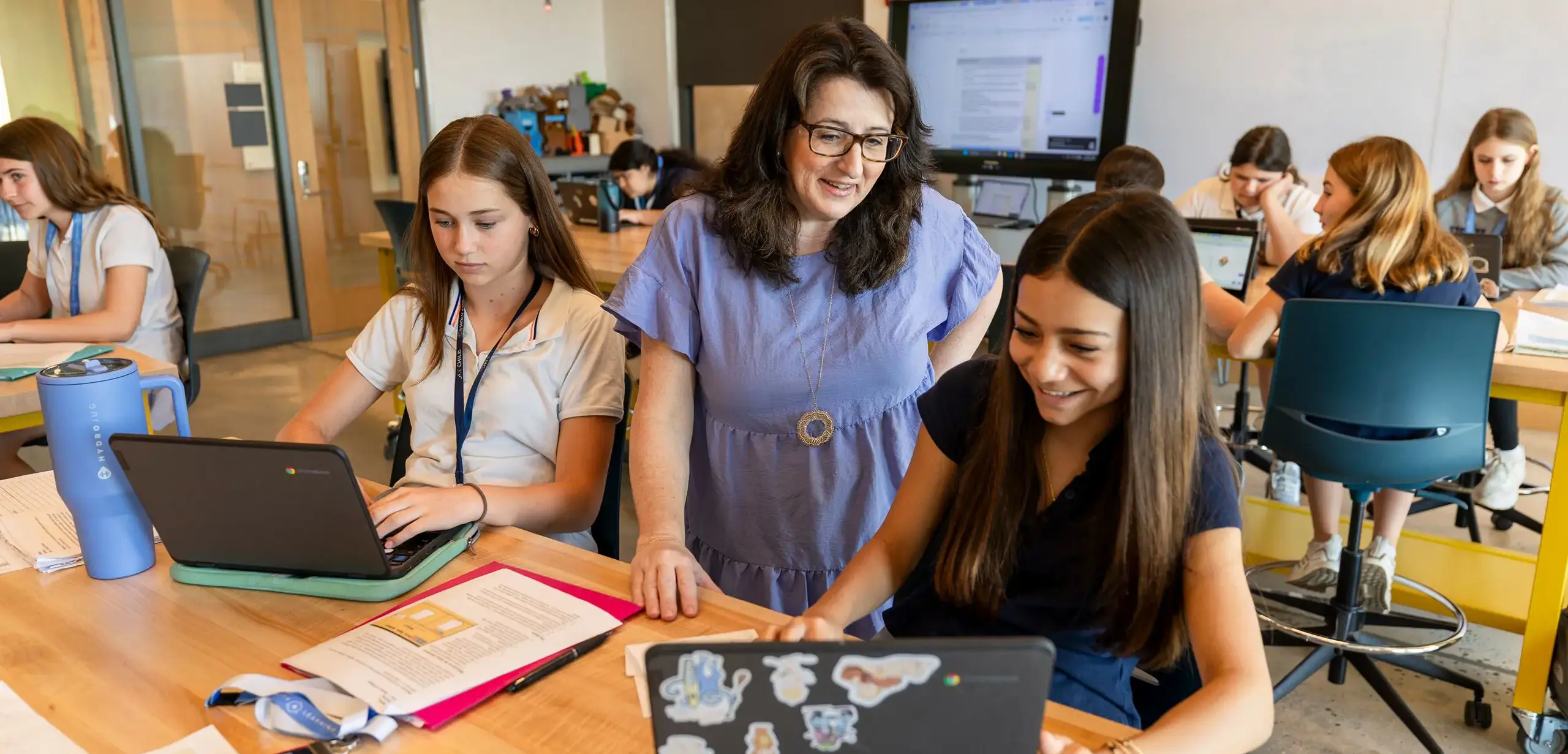 Teacher helping student during a lesson