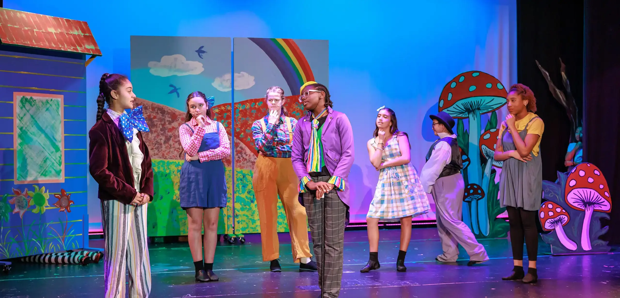 Students performing on stage