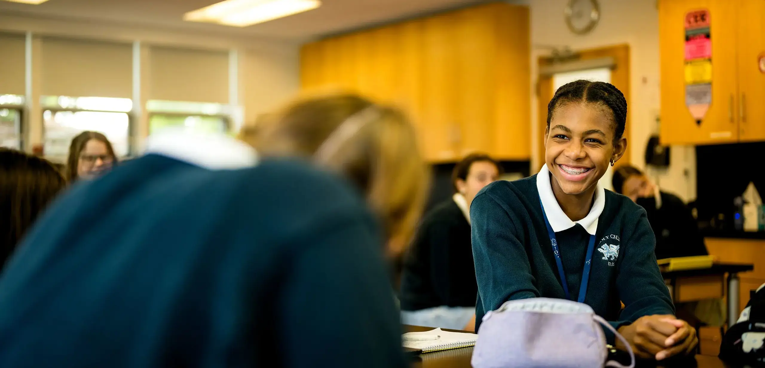 Student smiling in class