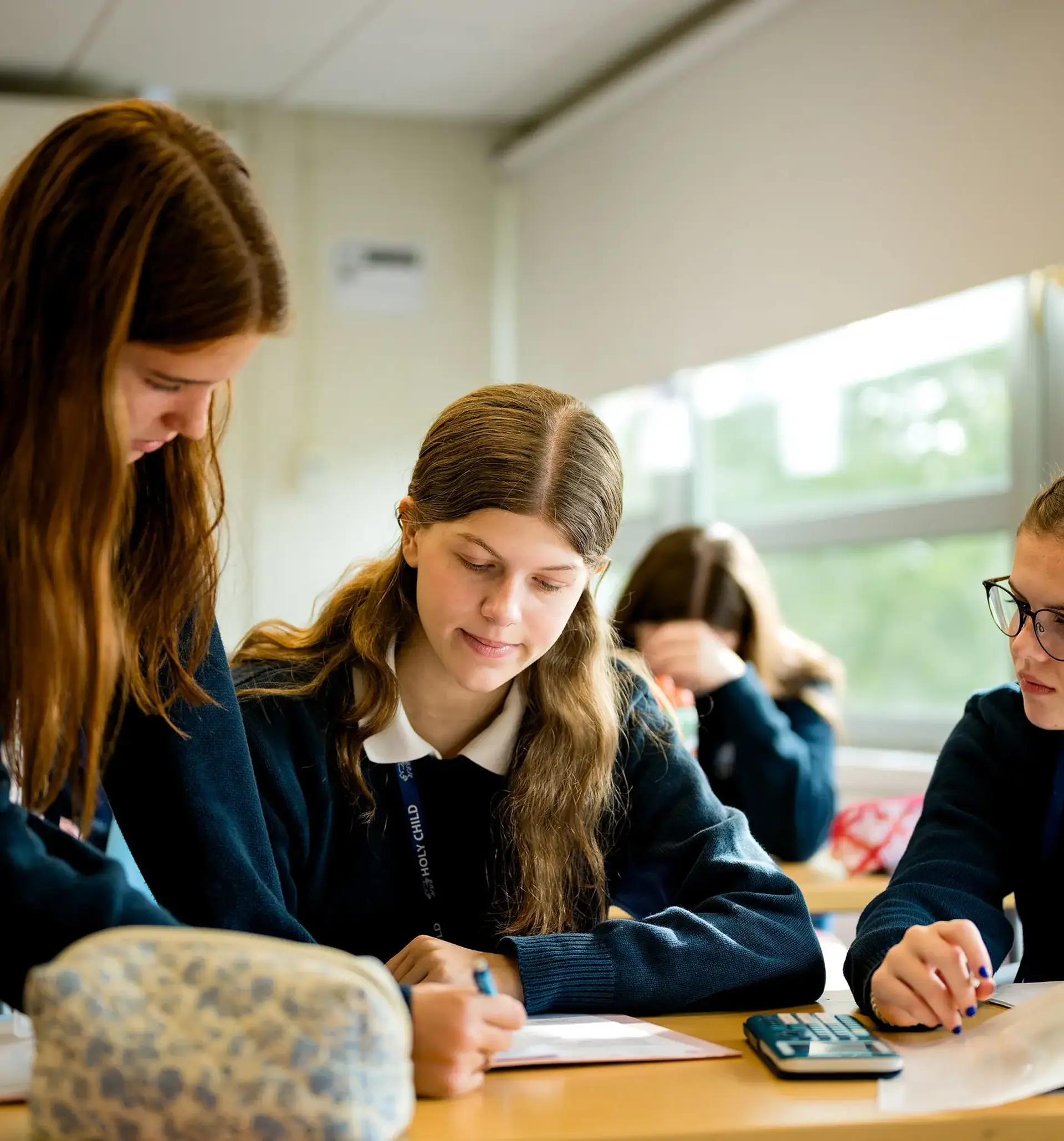 Upper School students at Holy Child collaborate on an assignment