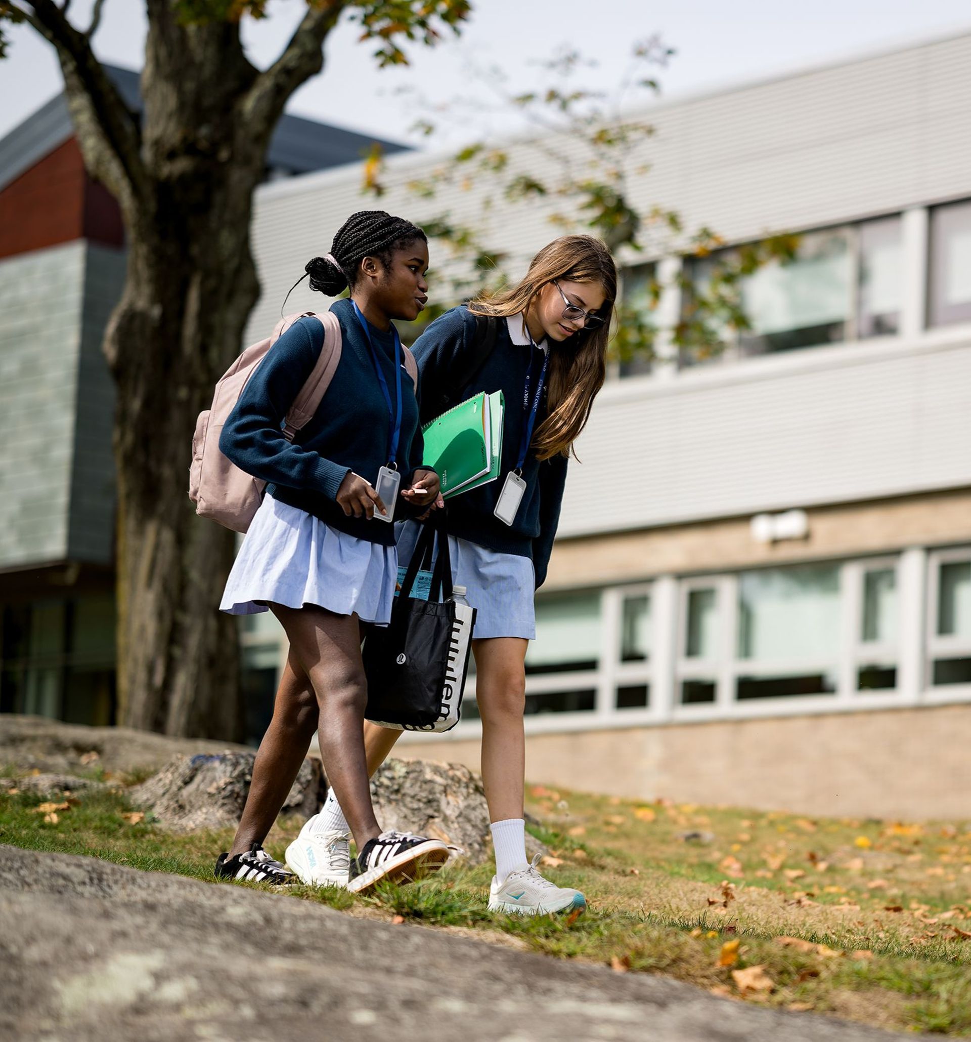 Students at Holy Child walking outside between classes.